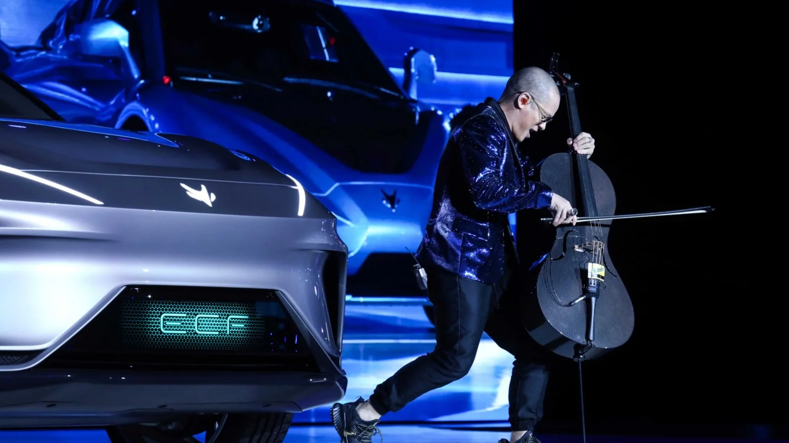 Dana Leong in a sequinned jacket performing AEON at its world premiere at Mercedes-Benz Arena, Shanghai